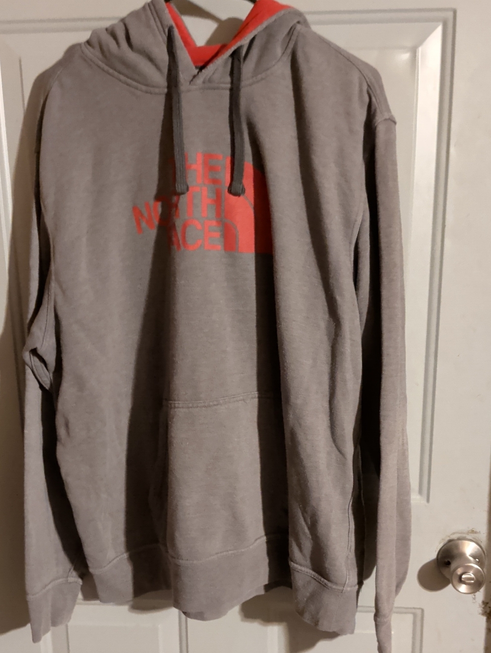 The North Face Men’s Light Gray Pullover Hoodie with Red Logo